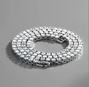 Detail of silver tennis chain with sparkling zircons and secure clasp mechanism