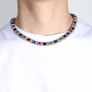 Macro detail of multicolored square-cut gemstone tennis chain in silver setting