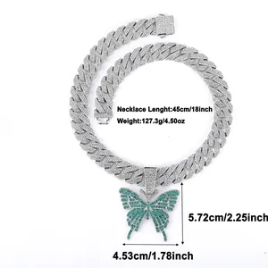 Close-up of iced out Cuban chain with butterfly pendant and 45cm 127g size details