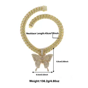 Chunky gold-plated Cuban link necklace with large butterfly pendant and sparkling rhinestones
