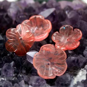 Macro shot of four translucent pink carved flower petals for DIY jewelry accessories