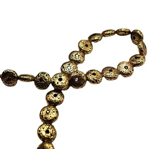 Flat disc-shaped golden volcanic stone beads with porous texture for DIY jewelry making