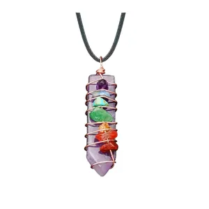 Arrow-shaped amethyst crystal necklace with copper wire wrap and seven chakra gemstones