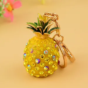 Mini yellow pineapple keychain with sparkling rhinestones and golden lobster clasp