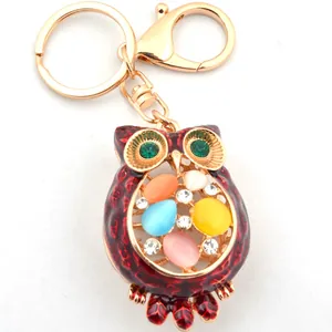 Sparkling owl keychain with colorful crystals and rhinestones on gold ring