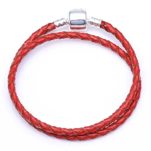 Bracelet double tour en cuir tressé rouge avec fermoir tonneau en argent poli