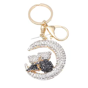 Sparkling moon and couple bears keychain with rhinestones and golden hardware