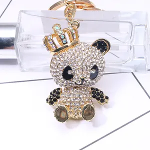Sparkling panda keychain with golden crown and rhinestones for handbags and purses