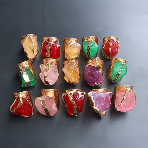 Set of 15 gold-plated bohemian rings featuring colorful natural raw crystal stones