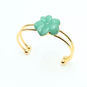 Golden double-layer open bangle with a green quartz petal flower charm for women