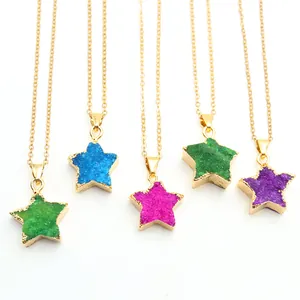 Detail of star-shaped druzy crystal necklaces in assorted vibrant colors with gold chains