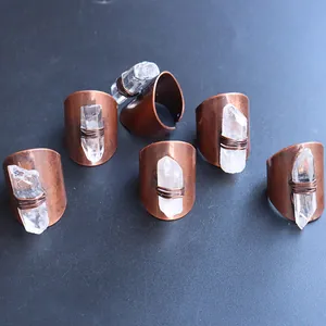 Vintage copper rings with natural white crystal raw stones in a bohemian raw style