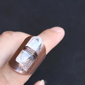 Vintage copper ring featuring a raw white crystal stone in a handmade wire-wrapped style