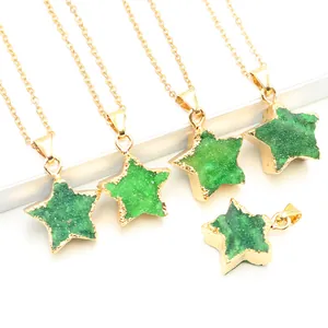 Detailed macro view of green star-shaped druzy agate pendants with golden metal edges