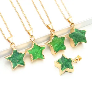 Detail of five-pointed star natural green agate druzy pendants with golden chain links