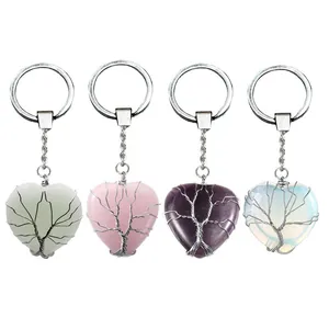 Set of four Tree of Life heart-shaped crystal keychains with handmade wire wrapping