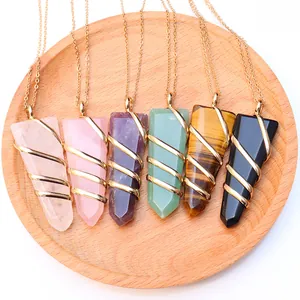 Assorted natural crystal sword pendants with gold wire wrapping and matching chains