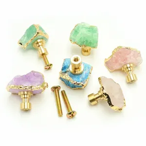 Brass drawer handles set with natural raw crystal stones in various colors and gold base