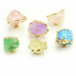 Luxurious brass drawer knobs set with multi-colored natural crystals and gold trim