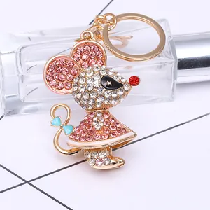 Porte-clés souris en cristal scintillant avec métal doré et nœud bleu chic
