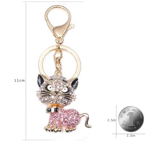 Porte-clés chat scintillant avec strass roses et blancs et alliage doré élégant