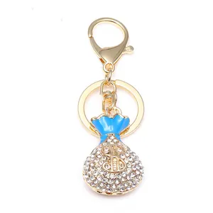Porte-clés sac d'argent en strass brillant avec signe dollar et fermoir mousqueton