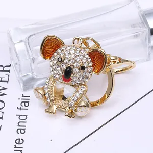 Porte-clés koala scintillant en alliage doré avec strass et grand cristal central