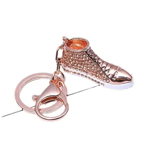 Rose gold canvas shoe keychain with sparkling rhinestones for bags and car keys