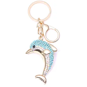 Porte-clés dauphin bleu scintillant avec placage en alliage doré et fermoir homard
