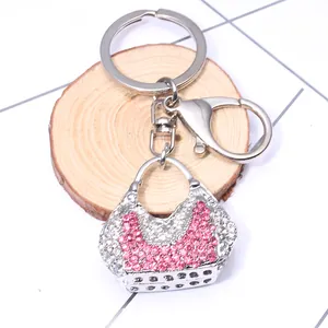 Creative alloy shell bag keychain with pink rhinestones and metal lobster clasp