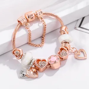 Rose gold crown bracelet with pink heart charms and sparkling crystals for women