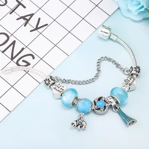 Bracelet à perles bleu avec chaîne serpent argentée et pendentif en forme de cœur