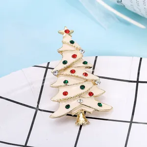 Charming enamel Christmas tree brooch with colorful rhinestones on a gold alloy base