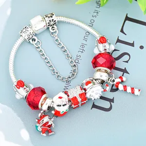Christmas charm bracelet with Santa Claus pendants and red crystals on snake chain