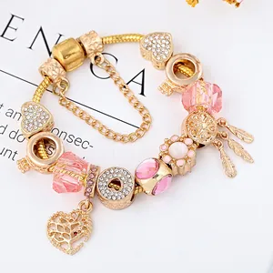 Bracelet doré pour femme avec cristaux roses, pendentifs cœur et breloques arbre de vie