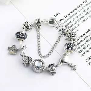 S925 silver charm bracelet featuring butterfly bee pendants and crystal beads with safety chain