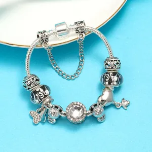 Silver charm bracelet with cartoon bee, butterfly pendants and Be Mine heart charm
