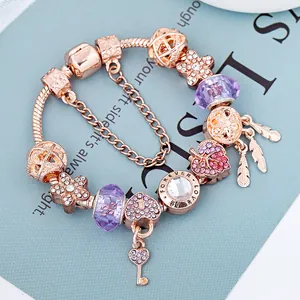 Armband in Roségold mit lila Kristall-Herzschlüssel und Forever Love Gravur