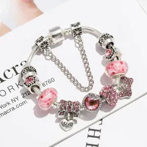 Bracelet argenté avec perles roses, nœud étincelant et pendentif cœur LOVE