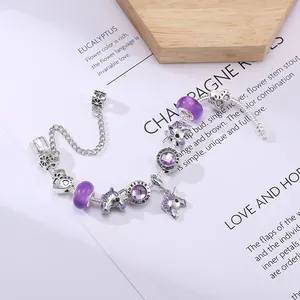DIY ασημένιο βραχιόλι με μονόκερο μωβ χάντρες και καρδιά με Love Is Forever