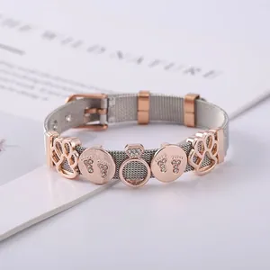 Mesh bracelet in silver and rose gold with diamond paw and footprint charms