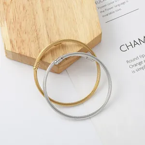Minimalist stainless steel cable twist bracelet set in gold and silver finish