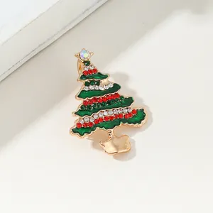 Elegant gold-tone Christmas tree brooch with green oil drop finish and colorful rhinestones