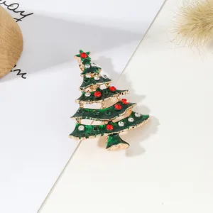 Exquisite gold alloy Christmas tree brooch with green enamel and vibrant rhinestones