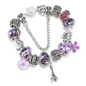 Bracelet à breloques Tour Eiffel et couronne avec perles violettes et pendentif en cœur