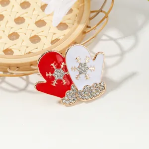 Creative red and white Christmas glove brooch with rhinestone snowflake design for holidays
