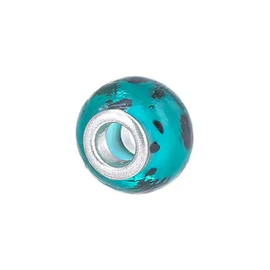 Groot gat glazen kraal in blauwgroen met zwarte stippen voor doe-het-zelf armbanden