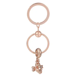 Rose gold heart dreamcatcher keychain with star hat pendant and crystal embellishments