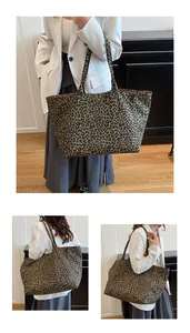 Detailed view of leopard print canvas tote bag with large capacity and double straps