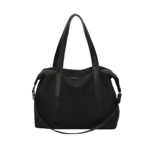 Sac fourre-tout en toile noire grande capacité avec design multi-sangles pour l'épaule